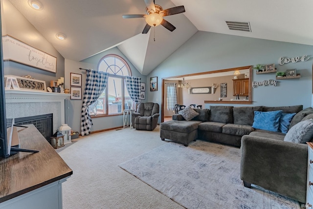12 Chrysler Ave, Wabash, IN 46992 - carpeted living room featuring a ceiling fan, lofted ceiling, a fireplace, and a chandelier