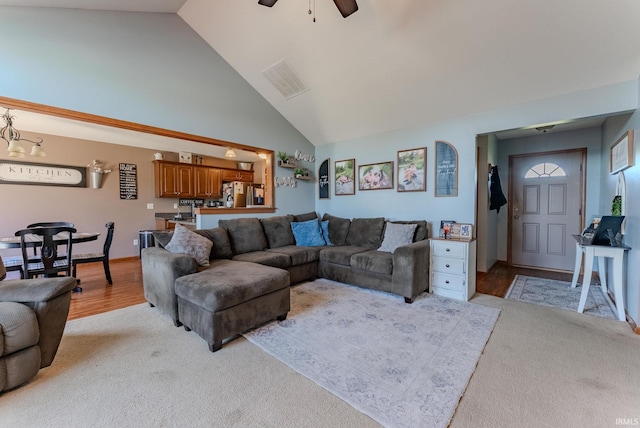 12 Chrysler Ave, Wabash, IN 46992 - living area with ceiling fan, high vaulted ceiling, and light colored carpet