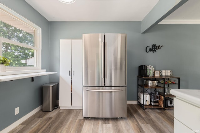 2721 Schumacher Dr, Mishawaka, IN 46545 - kitchen featuring freestanding refrigerator, wood finished floors, and light countertops