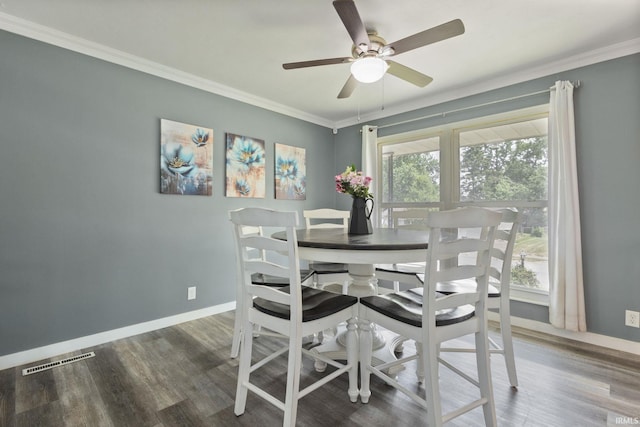 2721 Schumacher Dr, Mishawaka, IN 46545 - dining space featuring wood finished floors, ornamental molding, and ceiling fan