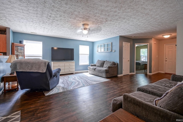 274 Chapelhill Dr, Lafayette, IN 47905 - living area with wood finished floors, healthy amount of natural light, and a textured ceiling