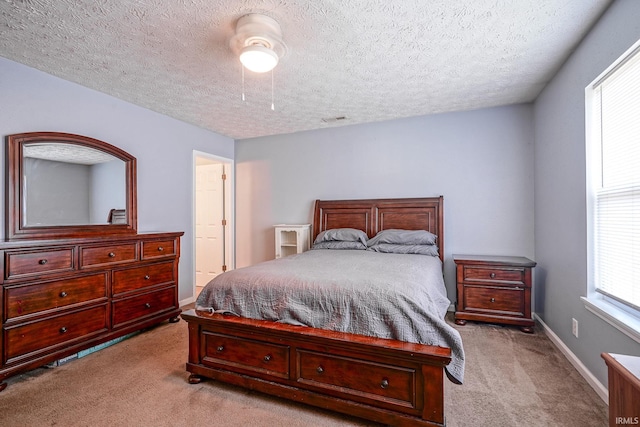 274 Chapelhill Dr, Lafayette, IN 47905 - bedroom featuring light colored carpet, a textured ceiling, and ceiling fan