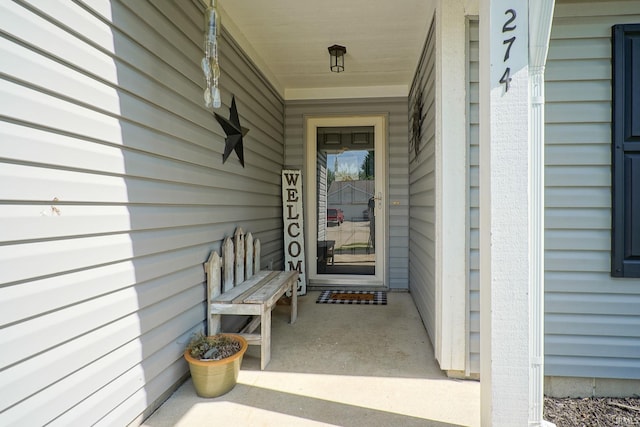 274 Chapelhill Dr, Lafayette, IN 47905 - view of exterior entry featuring a porch