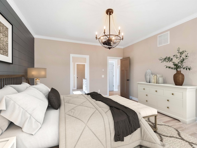 13092 Hallux Cv, Fort Wayne, IN 46845 - bedroom with crown molding, a chandelier, light wood finished floors, and wooden walls