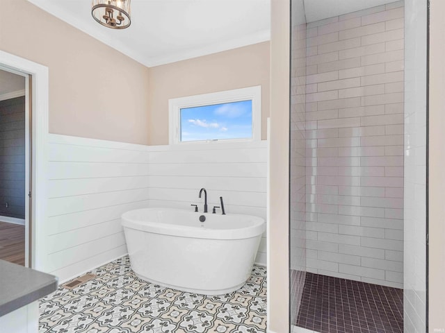 13092 Hallux Cv, Fort Wayne, IN 46845 - full bath with a freestanding tub, wainscoting, and tiled shower