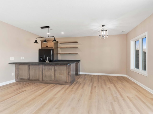13092 Hallux Cv, Fort Wayne, IN 46845 - bar with black fridge with ice dispenser, light wood-type flooring, decorative light fixtures, a chandelier, and recessed lighting