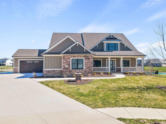 13092 Hallux Cv, Fort Wayne, IN 46845 - craftsman inspired home with board and batten siding, concrete driveway, a porch, and stone siding
