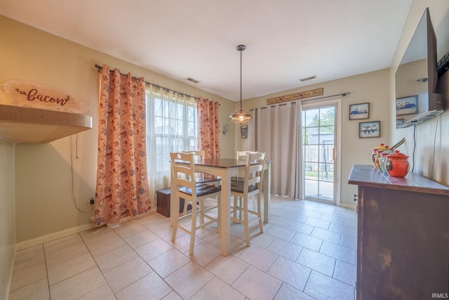 1510 W Crane Pond Dr, Marion, IN 46952 - dining room with baseboards and light tile patterned flooring