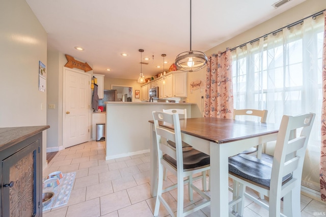 1510 W Crane Pond Dr, Marion, IN 46952 - dining space with light tile patterned floors and recessed lighting