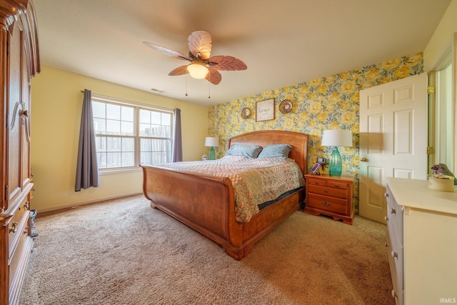 1510 W Crane Pond Dr, Marion, IN 46952 - bedroom featuring wallpapered walls, light colored carpet, and ceiling fan