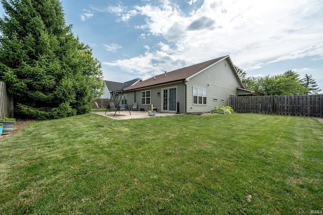 1510 W Crane Pond Dr, Marion, IN 46952 - rear view of property with a patio area and a fenced backyard