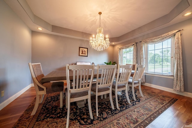 2220 Meadowbrook Dr, Marion, IN 46952 - dining space featuring a chandelier, recessed lighting, wood finished floors, and a raised ceiling