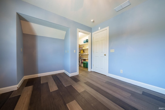 2220 Meadowbrook Dr, Marion, IN 46952 - spare room featuring baseboards and dark wood finished floors