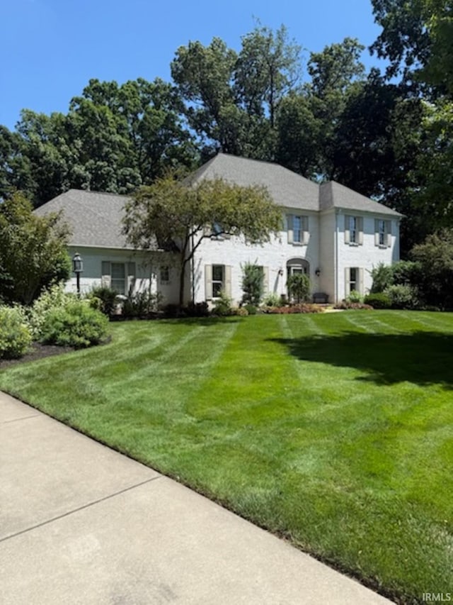 51310 Hidden Pines Ct, Granger, IN 46530 - view of front facade with a front lawn