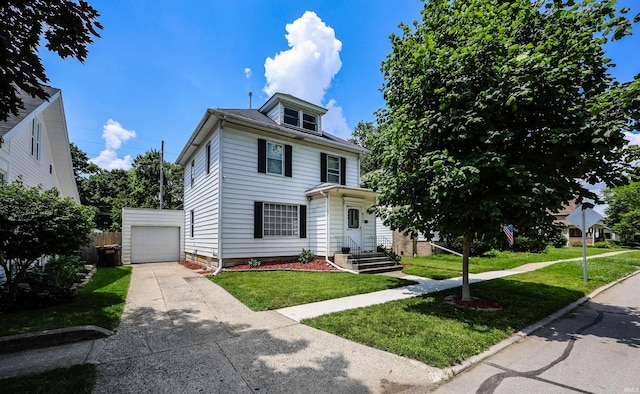 617 S Indiana Ave, Auburn, IN 46706 - traditional style home with concrete driveway, a front lawn, a garage, and an outdoor structure