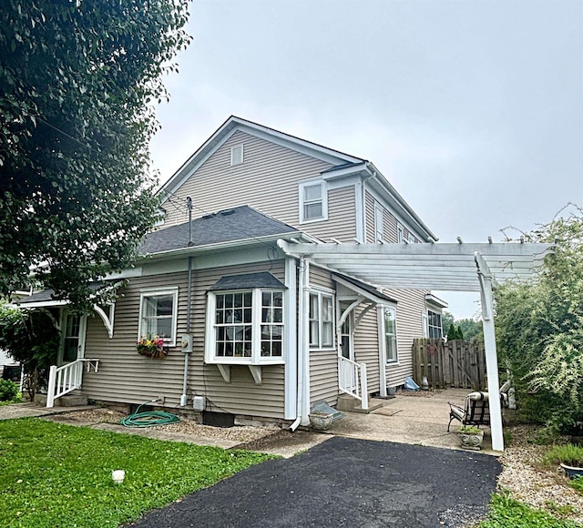 960 A St NE, Linton, IN 47441 - view of home's exterior featuring entry steps and a pergola