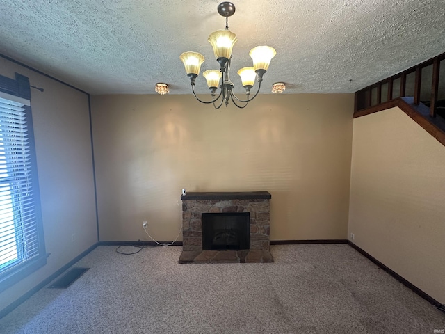 448 N 7th St, Mitchell, IN 47446 - unfurnished living room with carpet, a textured ceiling, a chandelier, a fireplace, and stairway