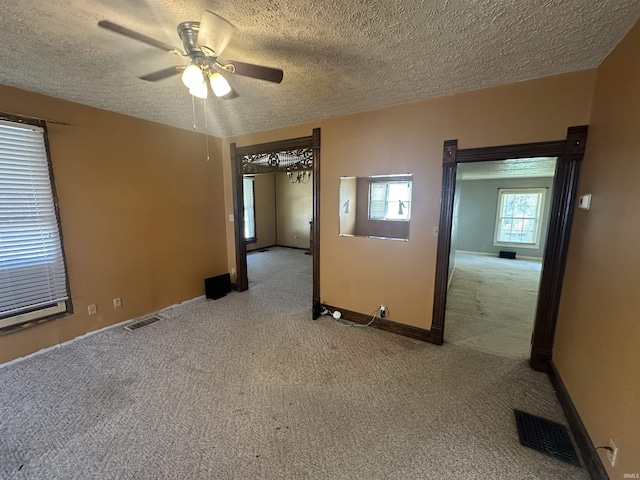 448 N 7th St, Mitchell, IN 47446 - carpeted empty room featuring ceiling fan and a textured ceiling