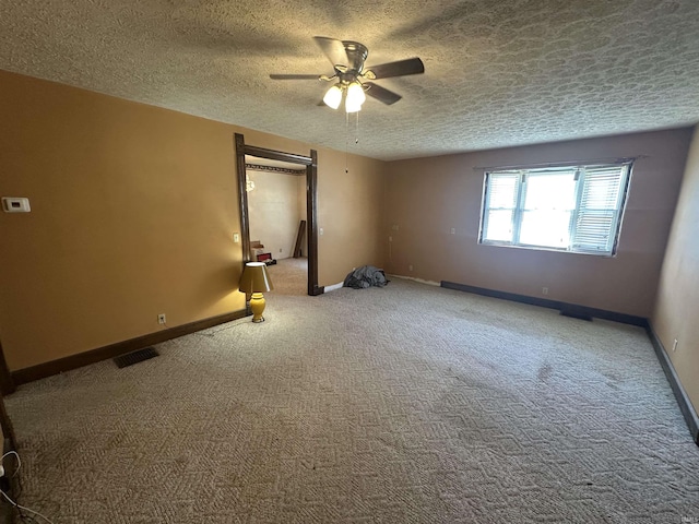 448 N 7th St, Mitchell, IN 47446 - carpeted empty room featuring a ceiling fan and a textured ceiling
