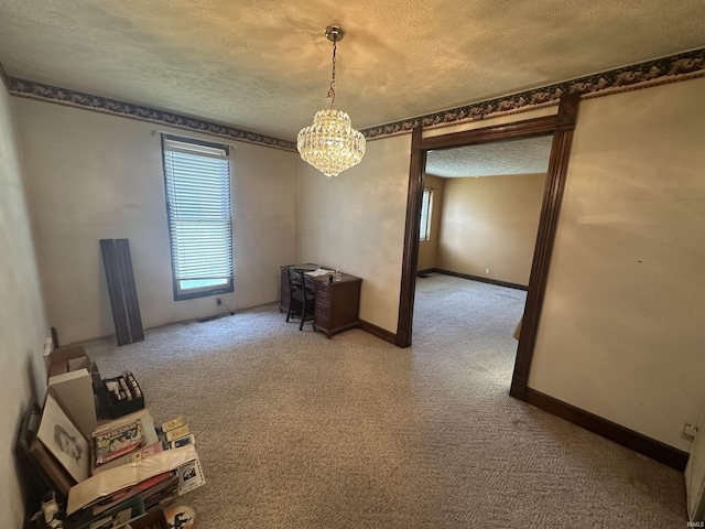 448 N 7th St, Mitchell, IN 47446 - carpeted empty room with a textured ceiling and a chandelier