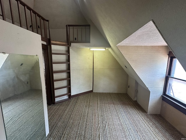 448 N 7th St, Mitchell, IN 47446 - bonus room featuring lofted ceiling and carpet