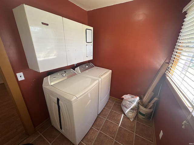 448 N 7th St, Mitchell, IN 47446 - laundry room featuring washer and dryer and dark tile patterned flooring