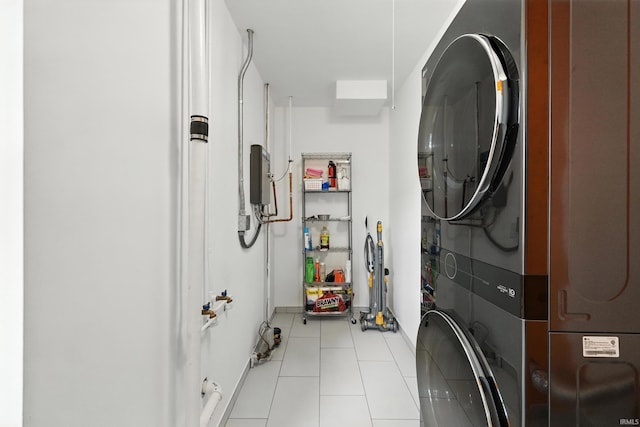 1914 Emerson Ave, Fort Wayne, IN 46808 - laundry room with stacked washing machine and dryer and light tile patterned flooring