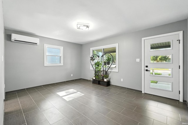 1914 Emerson Ave, Fort Wayne, IN 46808 - foyer featuring a wall mounted air conditioner and healthy amount of natural light