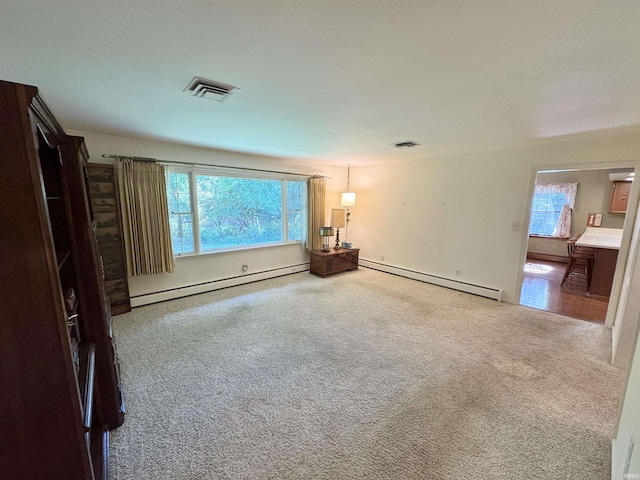 3105 Perrysburg Rd, Logansport, IN 46947 - empty room featuring a baseboard radiator, baseboard heating, and carpet flooring