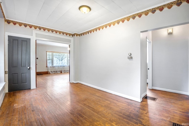 1331 Summit St, New Haven, IN 46774 - spare room with wood-type flooring and baseboards