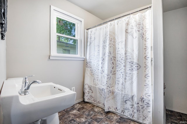 1331 Summit St, New Haven, IN 46774 - full bath featuring a shower with curtain and stone finish flooring