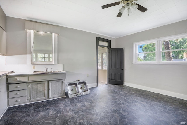 1331 Summit St, New Haven, IN 46774 - entrance foyer featuring dark stone finish flooring, a ceiling fan, and crown molding