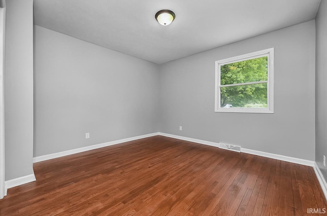 58155 Beehler Rd, Osceola, IN 46561 - spare room featuring dark wood finished floors and baseboards