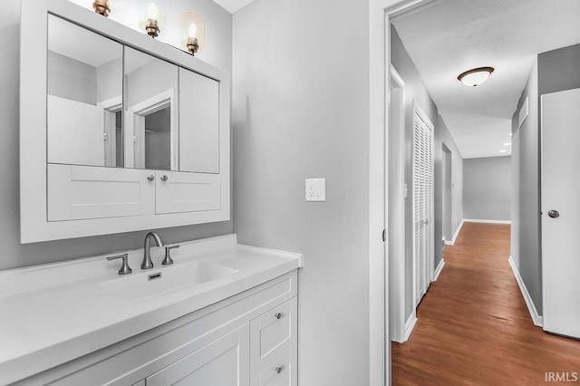 58155 Beehler Rd, Osceola, IN 46561 - bathroom featuring vanity and wood finished floors