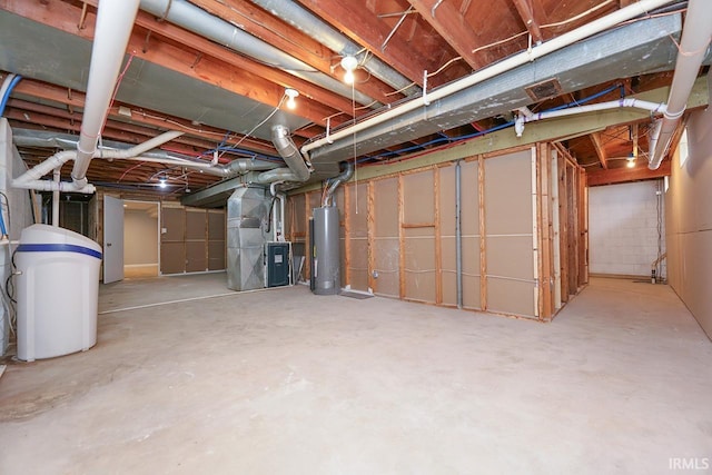 58155 Beehler Rd, Osceola, IN 46561 - unfinished basement featuring water heater, a water softener, and heating unit