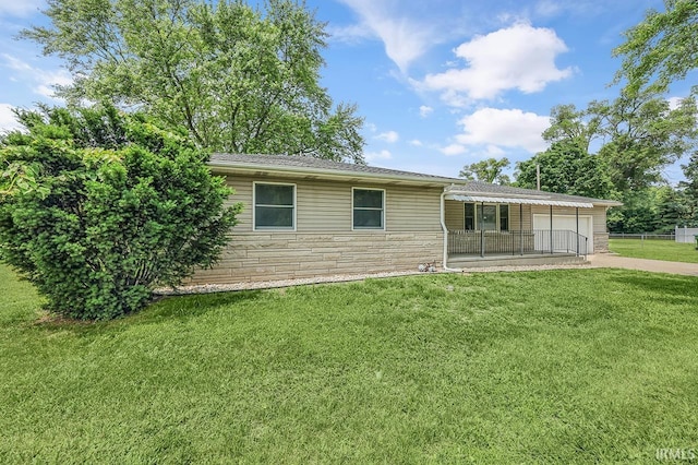 58155 Beehler Rd, Osceola, IN 46561 - ranch-style house featuring stone siding, a garage, and concrete driveway