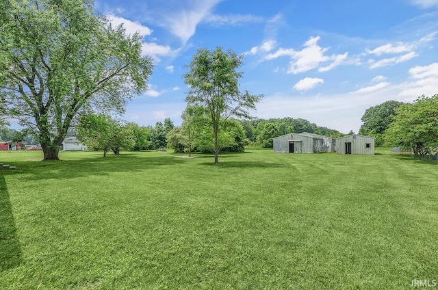 58155 Beehler Rd, Osceola, IN 46561 - view of grassy yard featuring an outbuilding