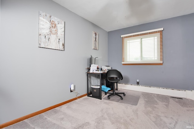 1401 S M St, Elwood, IN 46036 - carpeted home office with baseboards and a baseboard radiator