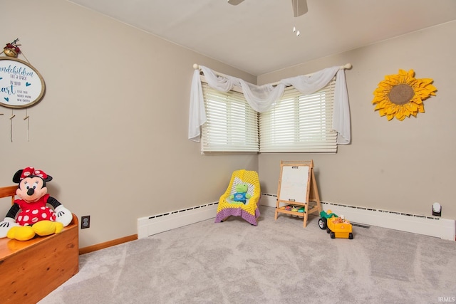 1401 S M St, Elwood, IN 46036 - game room with a baseboard heating unit, carpet, and ceiling fan
