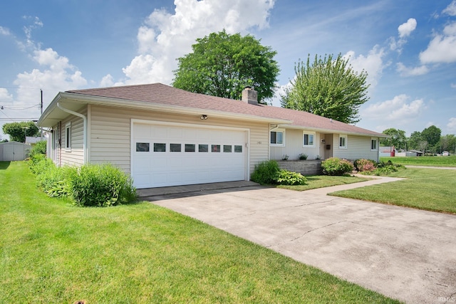 1401 S M St, Elwood, IN 46036 - single story home featuring concrete driveway, a chimney, an attached garage, and a front yard