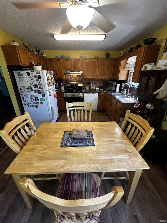 619 Briarfield Dr, Fort Wayne, IN 46825 - dining room with wood finished floors and a textured ceiling