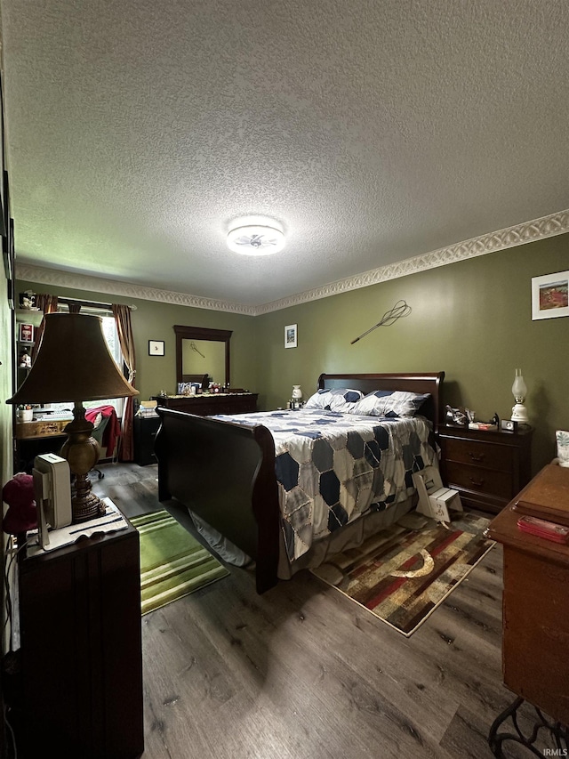 619 Briarfield Dr, Fort Wayne, IN 46825 - bedroom with wood finished floors and a textured ceiling