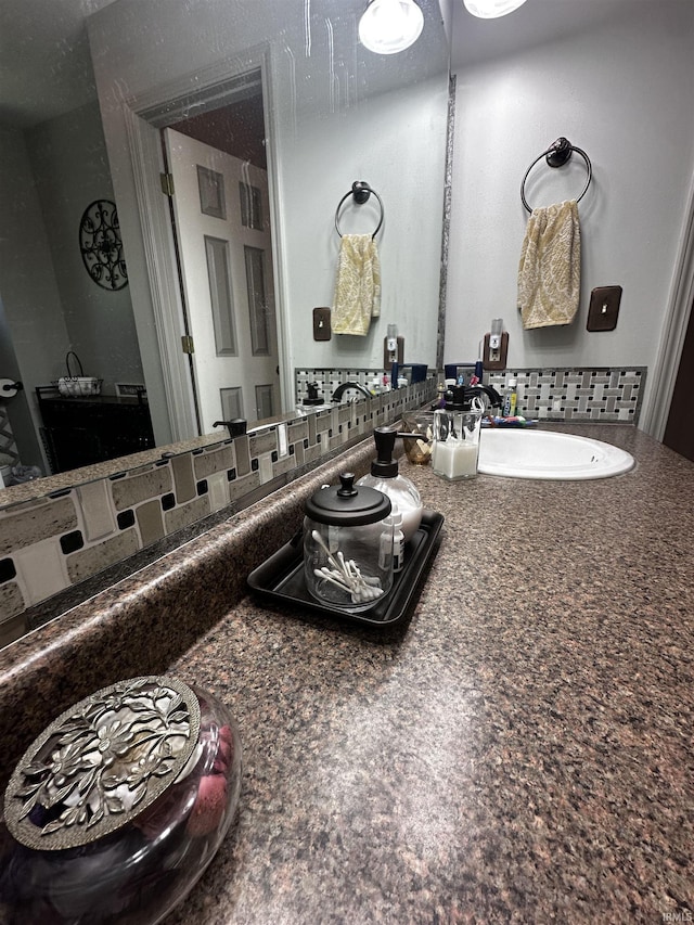 619 Briarfield Dr, Fort Wayne, IN 46825 - bathroom with vanity and tasteful backsplash