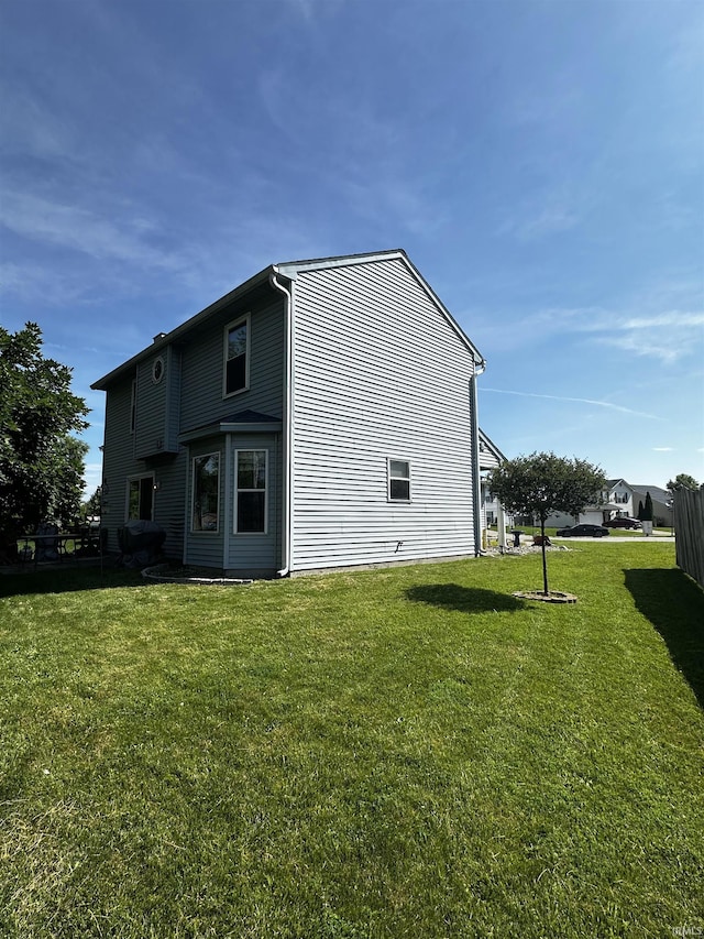 619 Briarfield Dr, Fort Wayne, IN 46825 - view of property exterior featuring a yard