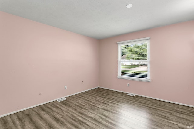 51278 Arch St, Granger, IN 46530 - unfurnished room with wood finished floors and baseboards