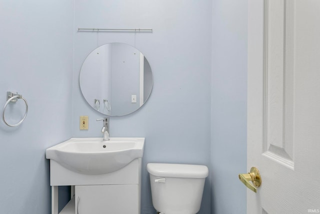 51278 Arch St, Granger, IN 46530 - half bathroom with vanity and toilet