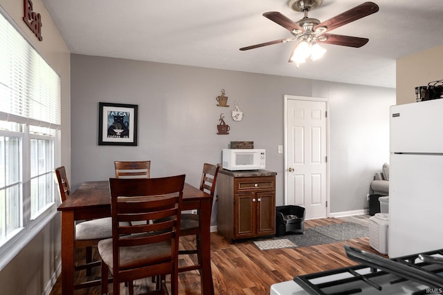 171 Vicksburg Ln, West Lafayette, IN 47906 - dining area with dark wood-style flooring and a ceiling fan