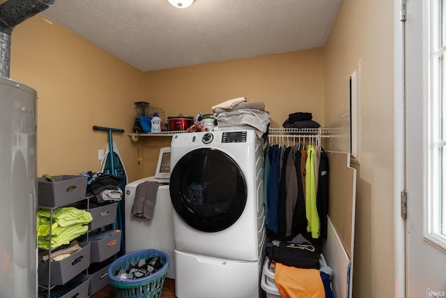 171 Vicksburg Ln, West Lafayette, IN 47906 - laundry area with washer / clothes dryer and a textured ceiling