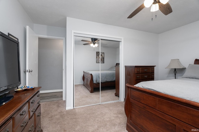 171 Vicksburg Ln, West Lafayette, IN 47906 - bedroom with light carpet, a closet, and ceiling fan