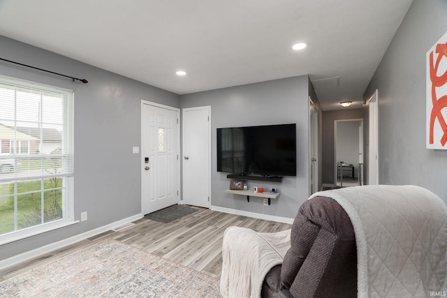 171 Vicksburg Ln, West Lafayette, IN 47906 - living area featuring wood finished floors, healthy amount of natural light, recessed lighting, and attic access